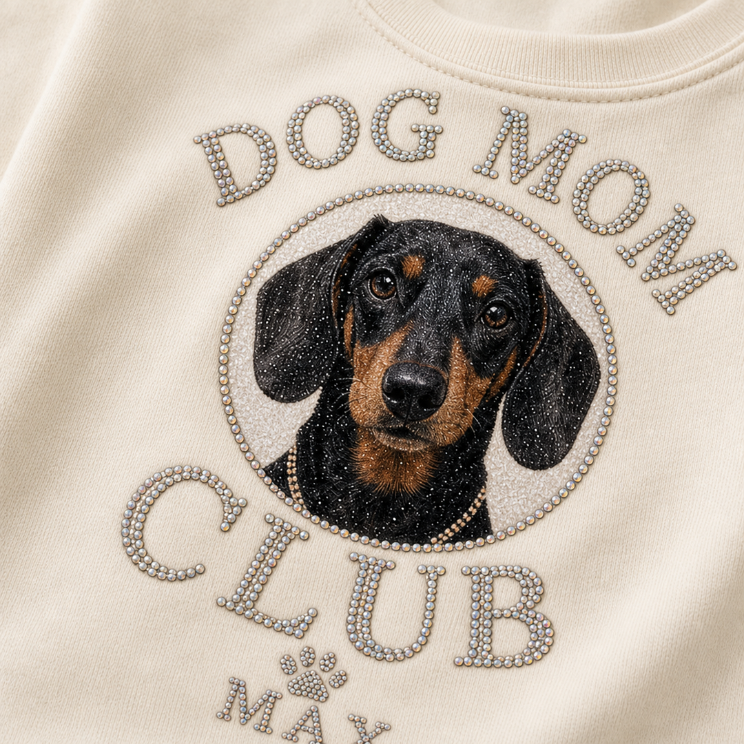 Close detail of custom Dog Mom Club tee with rhinestone-style lettering and dog photo