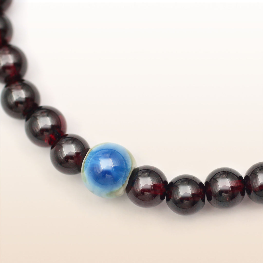 Garnet January Birthstone Bracelet With Evil Eye