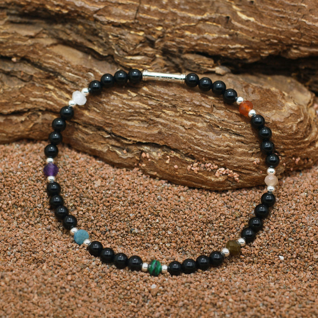 The balance 7 chakra bracelet made of naturally formed gemstones